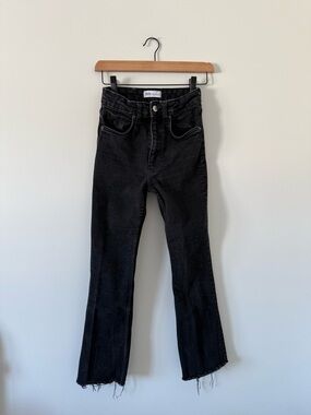 ZARA High Rise Black Flare Jeans with Raw Hem (size 2)